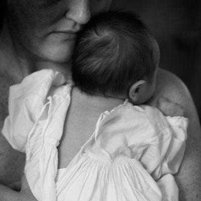 Mother holding baby hypnobirthing